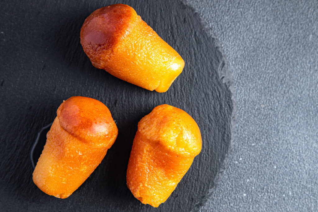 Rum Baba (Baba au Rhum) - Das Gebäck mit Rumsirup