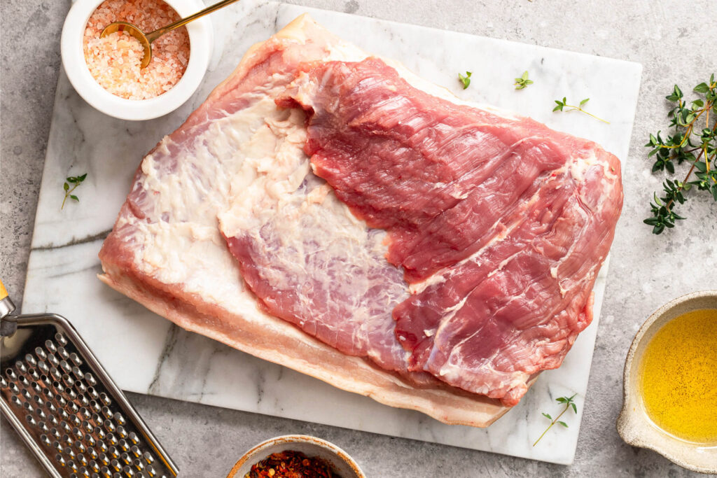 Porchetta aus dem Ofen - Schweinerollbraten mit Kräuterfüllung