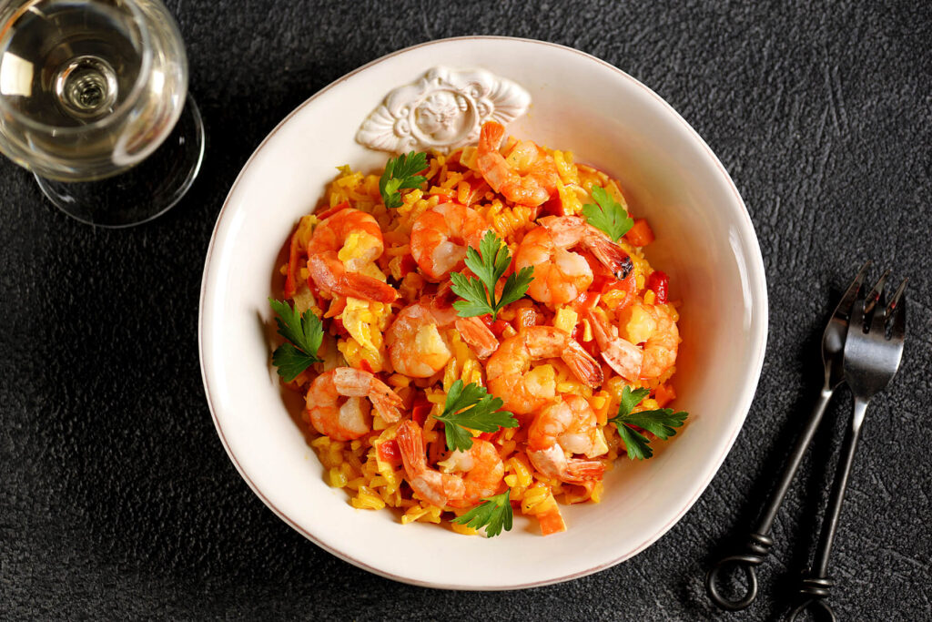 Garnelen-Risotto mediterran mit Tomaten und Paprika