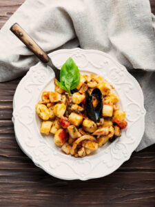 Gnocchi mit Meeresfrüchten in leichter Tomatensauce